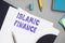 Business concept meaning ISLAMIC FINANCE with sign on the piece of paper