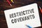 Business concept meaning Restrictive Covenants with phrase on the piece of paper