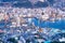 Business concept, modern cityscape of nagasaki dusk from mount inasa, the new top 3 nightview of the world, aerial view, copy