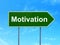 Business concept: Motivation on road sign background