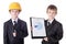 Business and construction concept - little boys in business suit