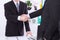 Business deal. Partnership meeting concept with successful businessmen handshaking at office background. Selective focus
