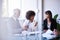 Business discussions. a group of business colleagues meeting in the boardroom.