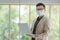 Business employees wearing mask during work in office to keep hygiene follow company policy.Preventive during the period of