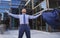 Business excitement. Business man keeping arms raised and expressing positivity outdoors. Businessman jumping for joy