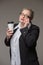 Business fat woman with coffee, mobile phone, documents and note