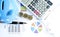 Business fountain pen with money coins stack with calculator and eyeglasses and blue piggy bank with document chart data for