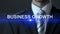 Business growth, man in formal suit touching screen, business concept, expansion
