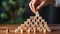 Business Growth Success Process - Woman Building Steps with Wooden Blocks