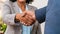 Business handshake of senior age businesspeople