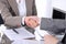 Business handshake. Two women lawyers are shaking hands after meeting or negotiation.