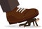 Business illustration concept of giant foot trampling a businessman