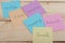 Business and innovation concept - colorful sticky notes with words research, vision, strategy, growth, innovation, marketing