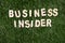 Business Insider Wooden Sign On Grass