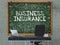 Business Insurance on Chalkboard with Doodle Icons. 3D Render.