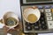 Business Investment Calculation/ business financial planning/ business startup illustrated with egg shell, calculator, and coins