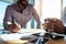 Business investors planning business sitting at table in office.