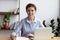 Business lady sitting at desk hold pen ready sign contract