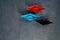 Business leadership Concept, Paper Boat, the key opinion Leader, the concept of influence.Red.blue and black paper boat as the