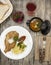 Business lunch : Petite Wiener schnitzel with boiled potatoes and ketchup. Served on a white porcelain plate with fork and knife o