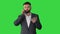 Business man with a beard making a serious call on a Green Screen, Chroma Key.