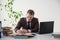 Business man in a business suit portrait work in Office talks