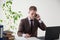 Business man in a business suit portrait work in Office talks