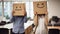 Business man and businesswoman covering face with cardboard box showing happy and sad face. Generative AI