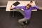 Business man exercising at desk at workplace