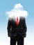 Business man with head in the clouds