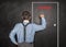 Business man knock by fist on door blackboard. Opportunity concept