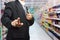 Business man pushing in supermarket in blurry