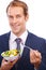 Business man, smile portrait and eating salad for healthy nutrition, green food diet and employee health motivation