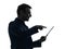 Business man touchscreen digital tablet silhouette