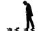 Business man walking behind his shoes clothes silhouette