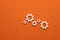 Business mechanism concept, flat graphic resource for design - Gears on orange color background