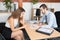 business meeting at desk in office beauty businesswoman with handsome businessman