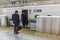 Business men boarding Shinkansen train Japan