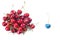 Business metaphor,solution,innovation,idea,consulting, bunch of cherrys with one cherry blue colored, flat lay,copy space