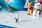 business miniature figures people on 31 day calendar and christmas ornamental background