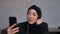 Business Muslim ethnicity woman, involved in distant video call conversation whit family or meeting with colleagues