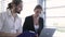 Business office. Man and woman working at computer