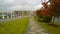 Business office park. Orange color corporate buildings. Modern architecture. Empty sidewalk. Autumn scene. Real city life. Nobody.