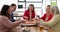 .Business office people group together sharing pizza slices from box on table