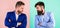 Business partners competitors in suits with tense bearded faces. Businessmen stylish appearance jacket pink blue