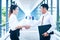 Business partnership handshaking after striking deal outdoors at