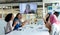 Business people applauding during video conference at conference room in a modern office