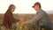 Business people check the quality of wheat. agricultural business. farmer man and woman evaluate cereal harvest