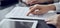 Business people discussing contract signing deal while sitting at the glass table in office, closeup. Partners or