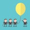 Business people holding balloon